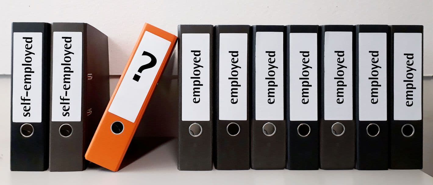 two files with the label "self-employed" on the left and seven files with the label "employed" on the right. Between one orange file with a questionmark on it. The picture ist symbolising bogus self-employment.