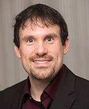 Das Bild zeigt ein Portraitfoto von Michael Kelka.