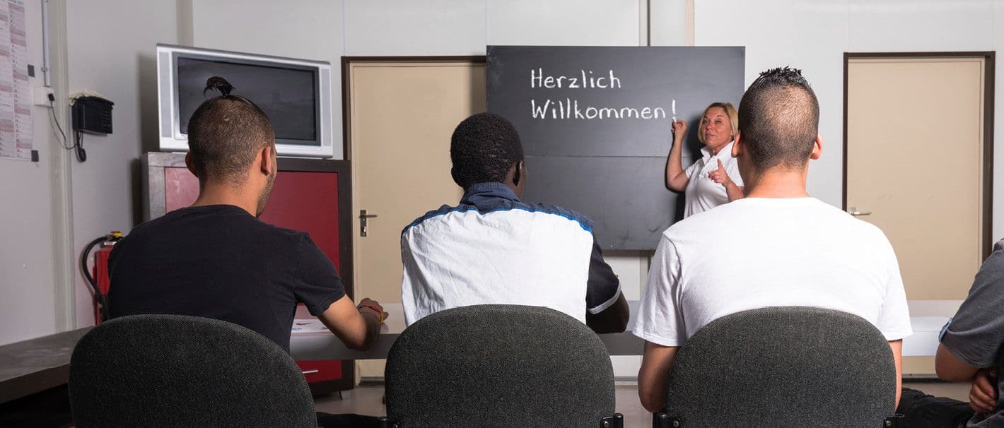 Motiv von einem Sprachkurs für Menschen mit Migrationshintergrund